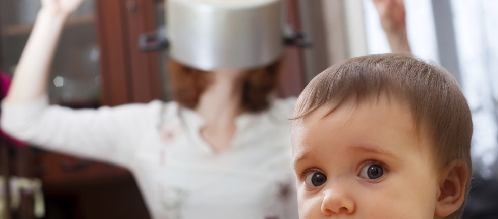 Scared baby against crazy mother