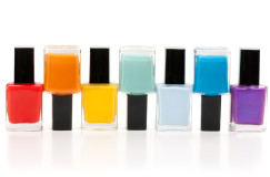 Group of nail polishes isolated on white