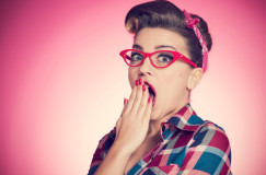 Portrait of shocked pin-up girl
